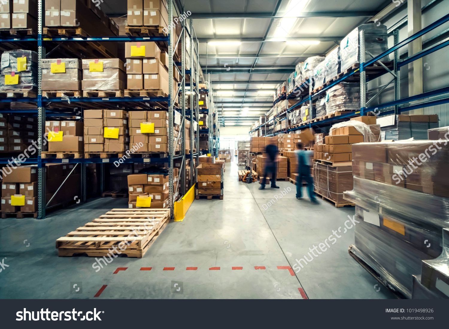 warehouse interior with shelves, pallets and boxes #1019498926