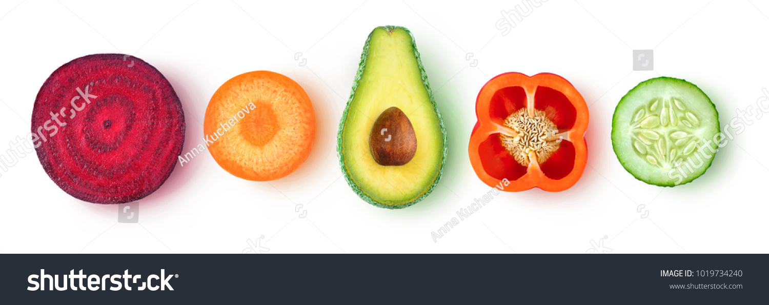 Isolated vegetable pieces. Fresh slices of vegetables (beetroot, carrot, avocado, bell pepper, cucumber) in a row, top view, isolated on white background with clipping path #1019734240