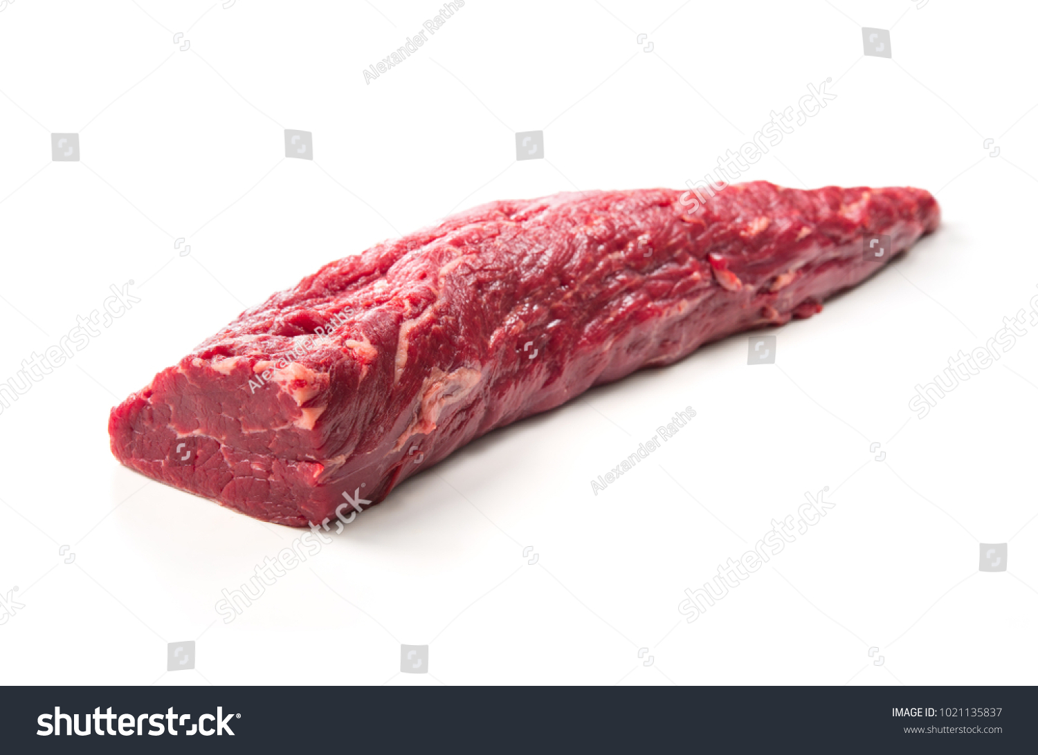 Fresh and raw beef meat. Whole piece of tenderloin ready to cook isolated on white background #1021135837