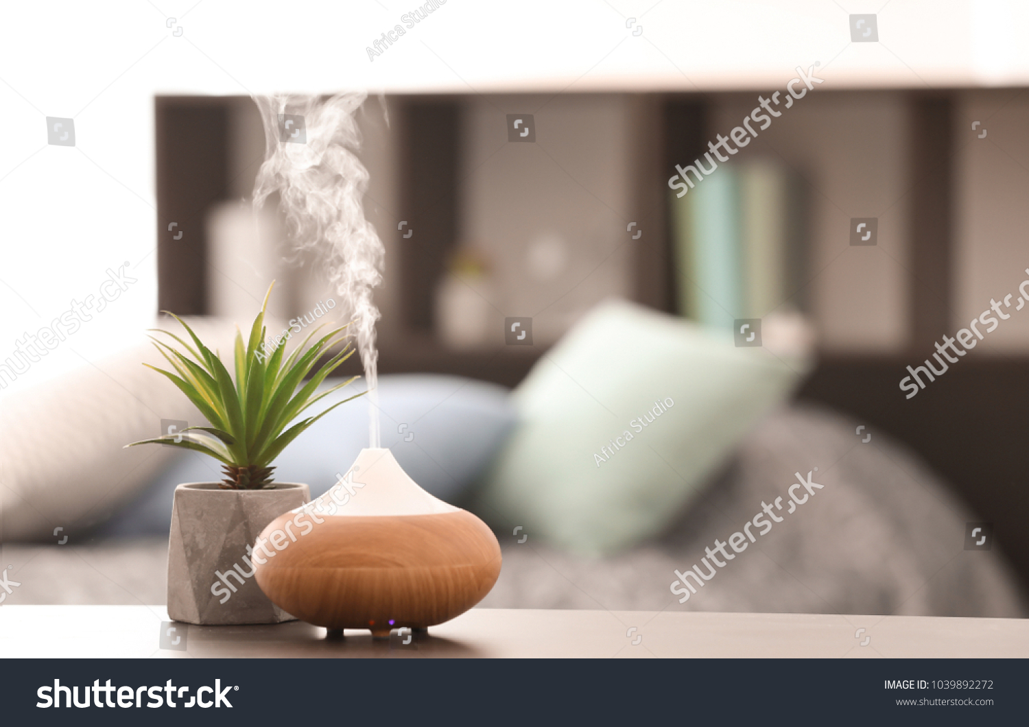 Aroma lamp on table #1039892272