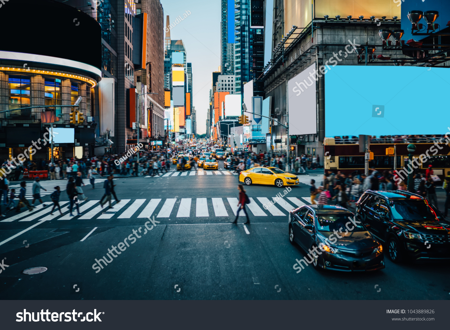Famous Times Square landmark in New York downtown with mock up billboards for advertising and commercial information content. Big metropolis urban scene with development infrastructure with Lighboxes #1043889826