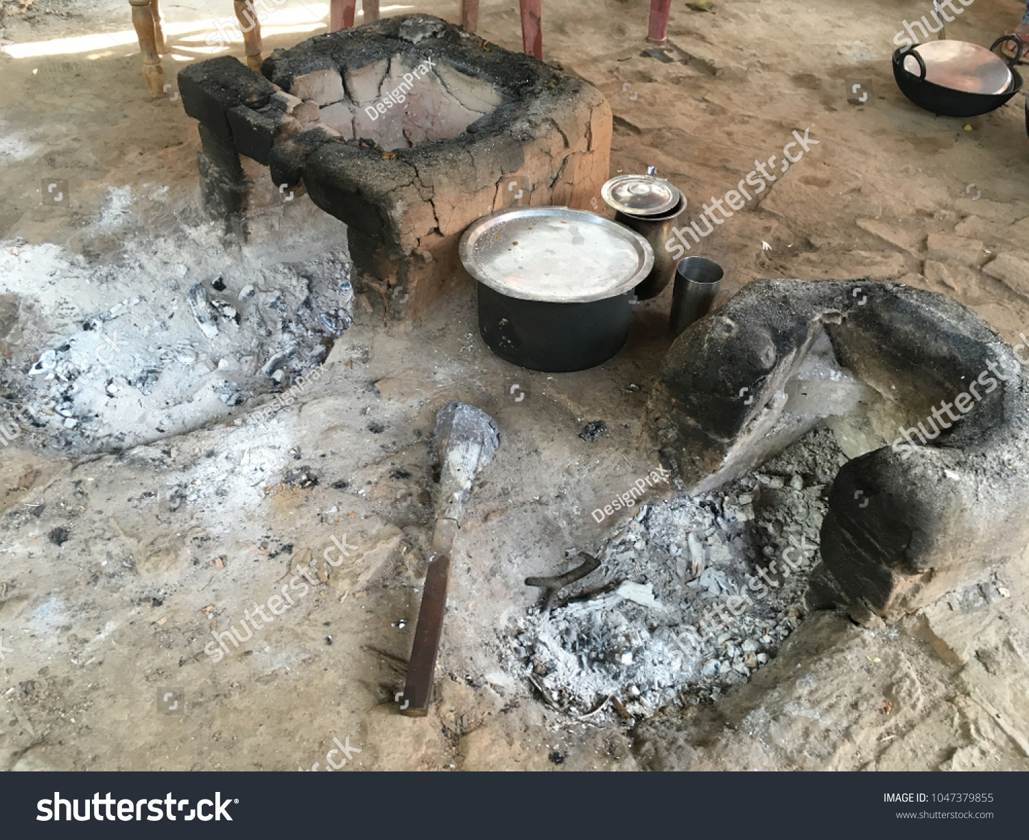 Cooking Mud Brick Stove in Rural India #1047379855
