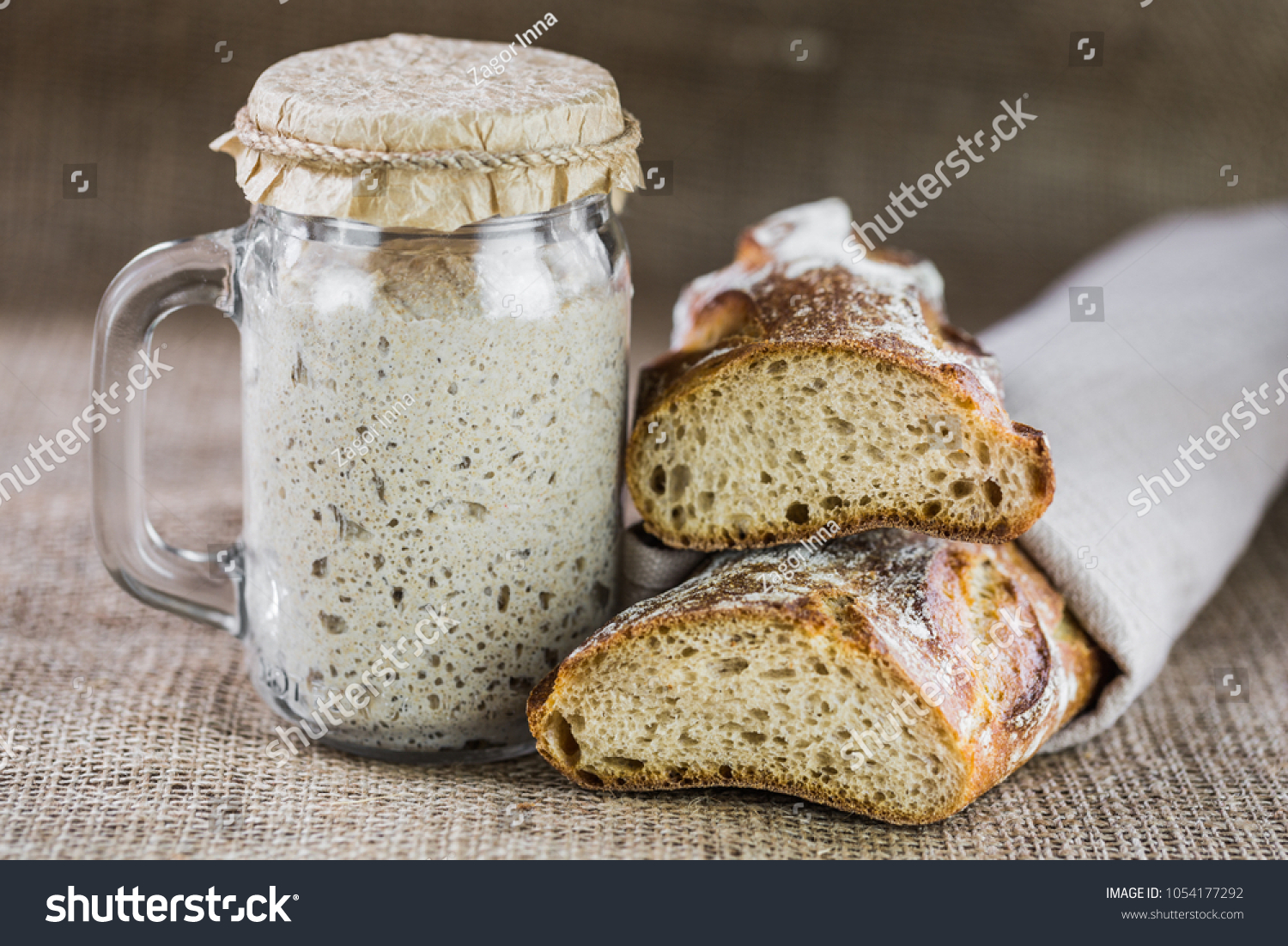 The leaven for bread is active. Startersourdough. The concept of a healthy diet #1054177292