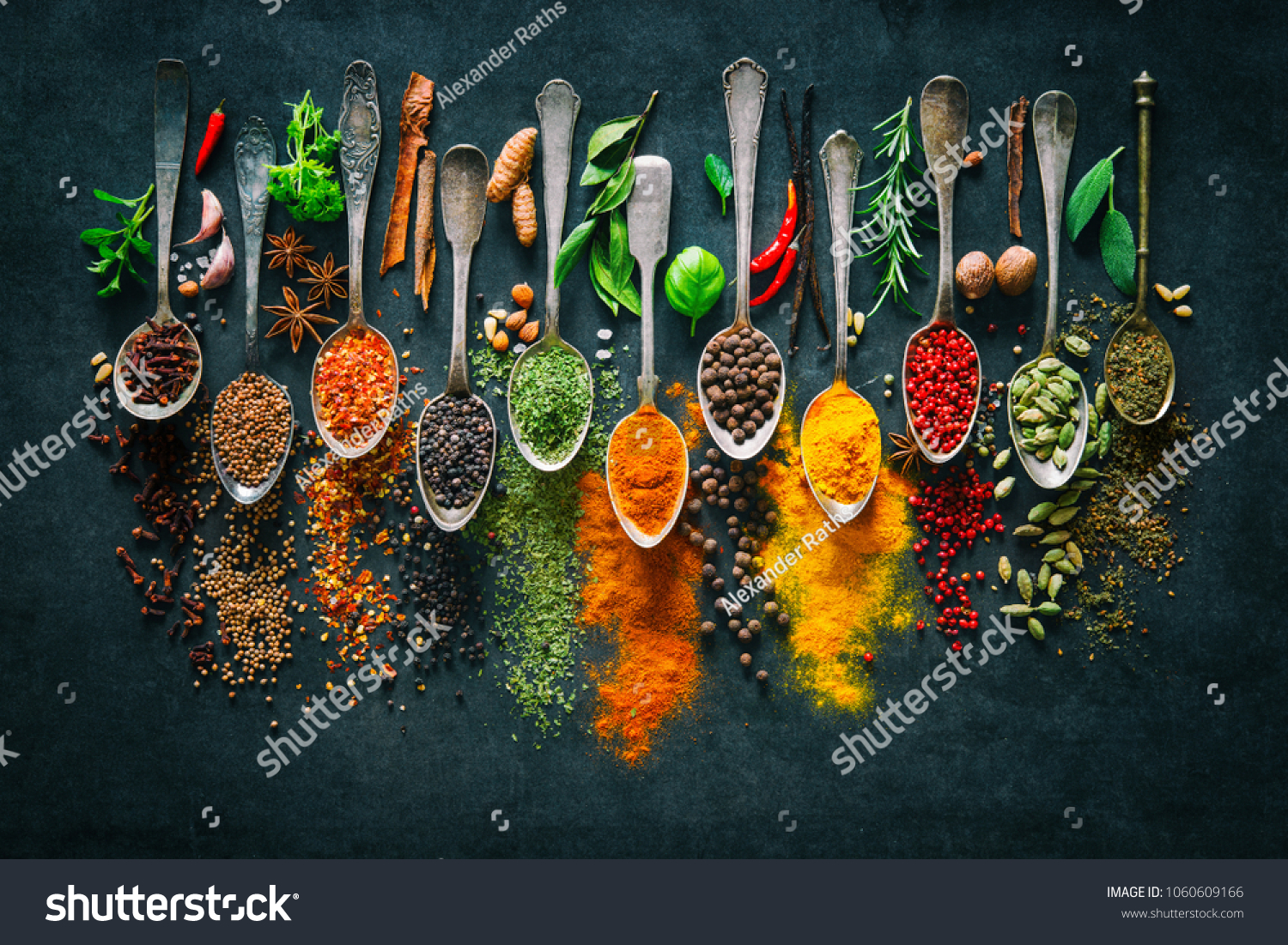 Colourful various herbs and spices for cooking on dark background  #1060609166