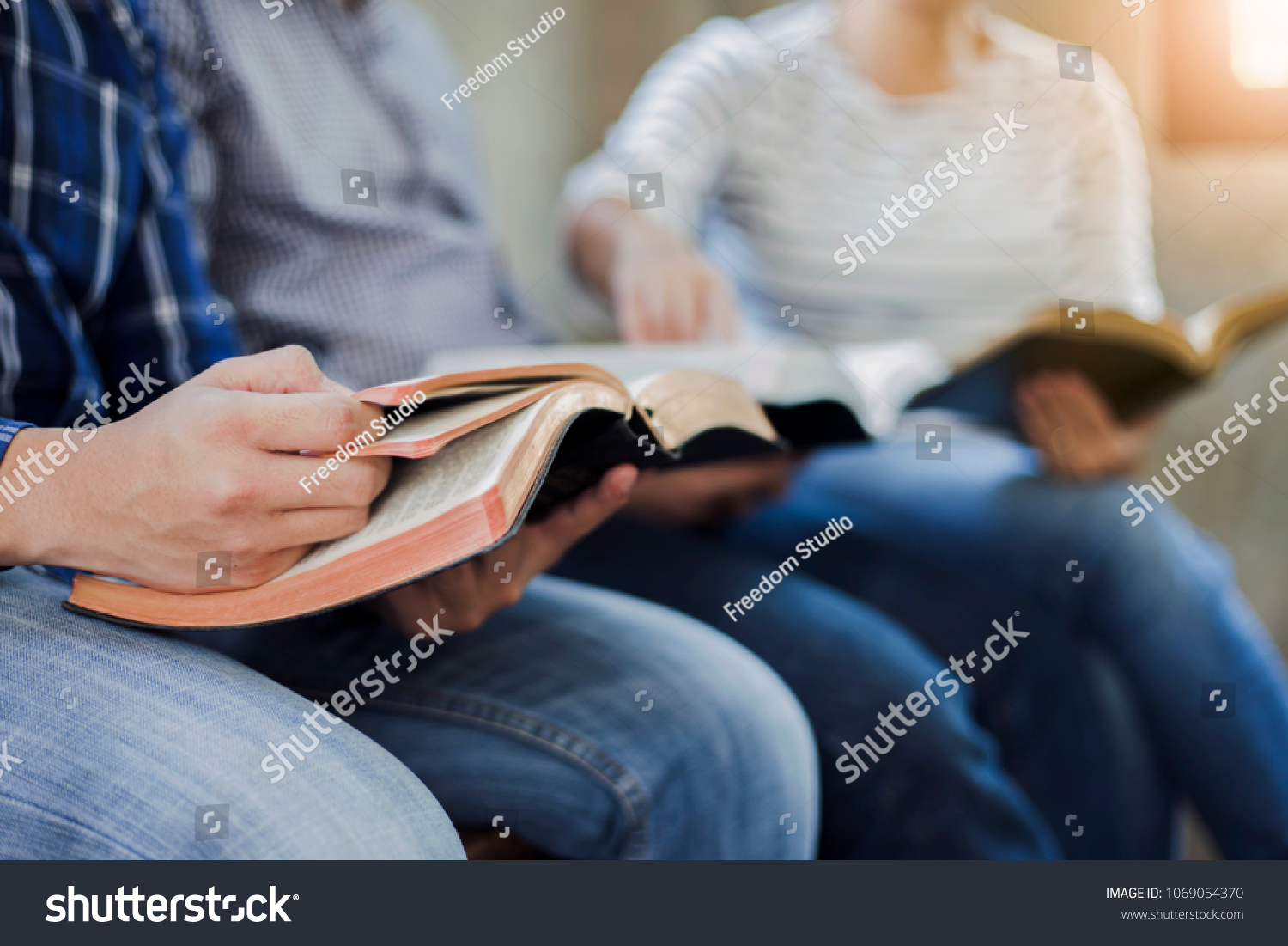 close up of christian group are reading and study bible together in Sunday school class room #1069054370