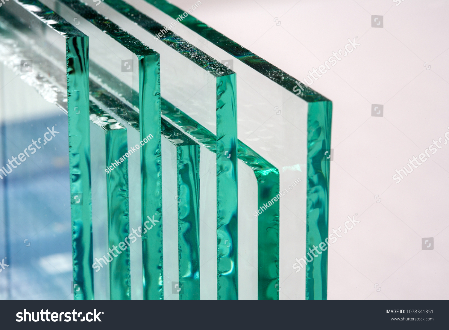 Sheets of Factory manufacturing tempered clear float glass panels cut to size #1078341851