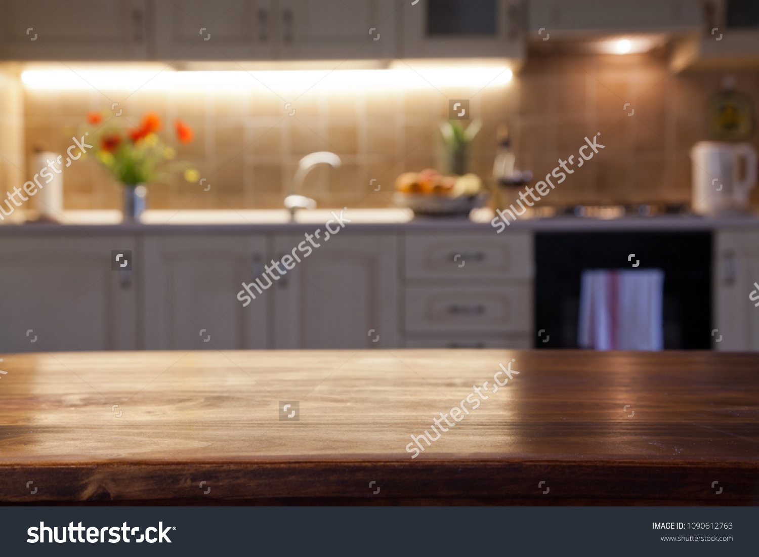 blurred kitchen interior and napkin and desk space #1090612763