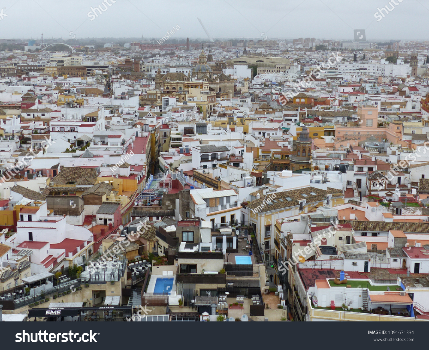 Seville, Spain / Spain - March 2018: View over Sevilla seen from Giralda #1091671334