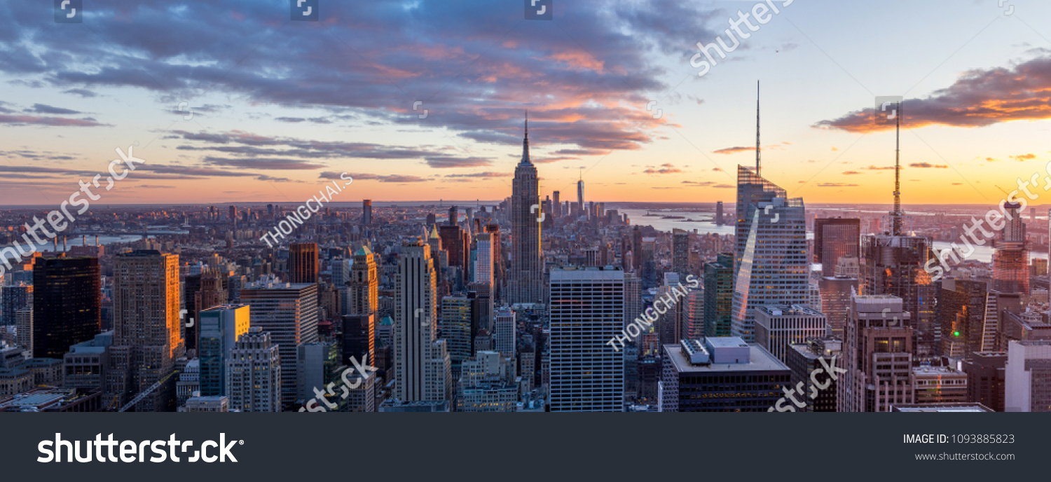 Amazing panorama view of  New York city skyline and skyscraper at sunset. Beautiful night view in Midtown Manhatton. #1093885823