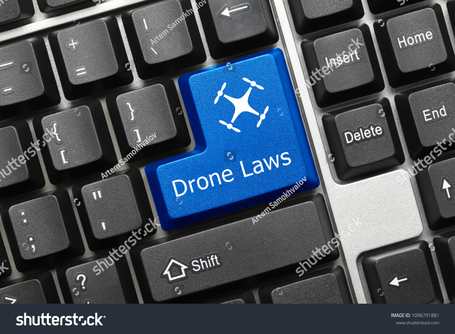 Close-up view on conceptual keyboard - Drone Laws (blue key) #1096791881