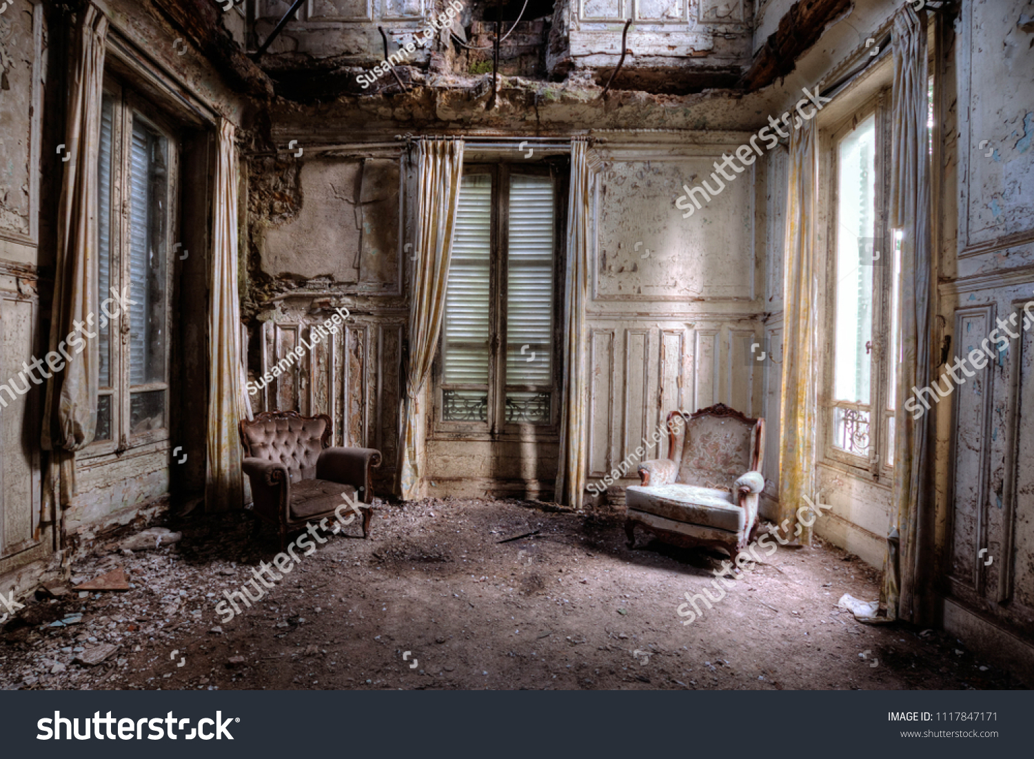 Chairs in an abandoned room in france #1117847171