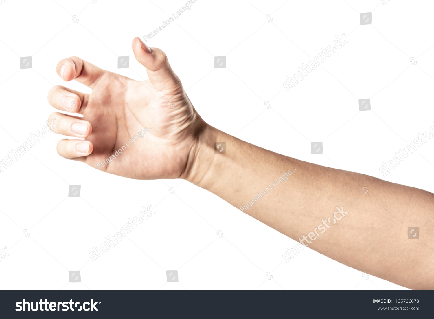 Close up hand holding something like a bottle or can isolated on white background with clipping path. #1135736678