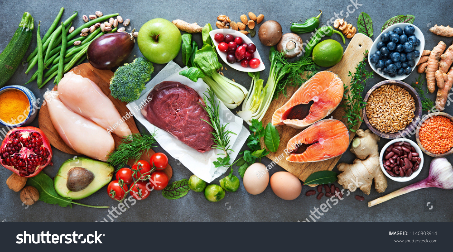 Balanced diet food background. Organic food for healthy nutrition, superfoods, meat, fish, legumes, nuts, seeds and greens  #1140303914