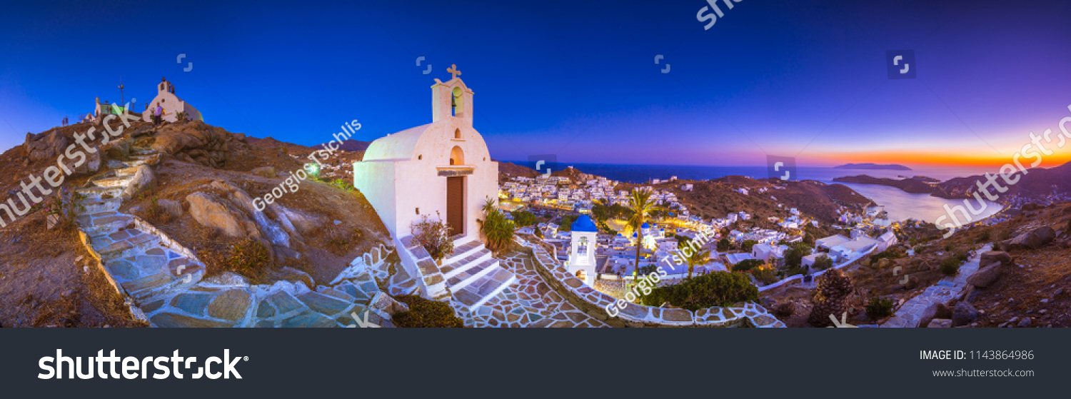 Panorama of Ios Chora and old harbor at sunset, Cyclades, Greece. #1143864986