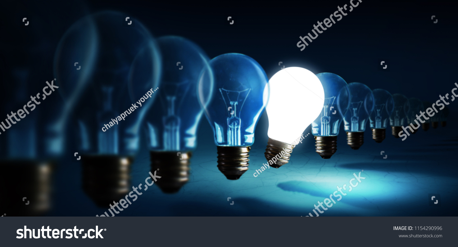 Lightbulbs on blue background, idea concept #1154290996