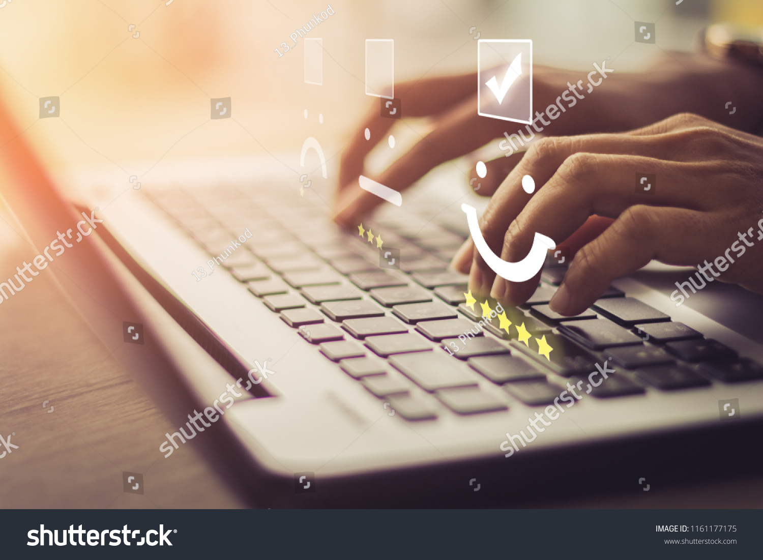 Businesswoman pressing face emoticon on the keyboard laptop / Customer service evaluation concept.
 #1161177175