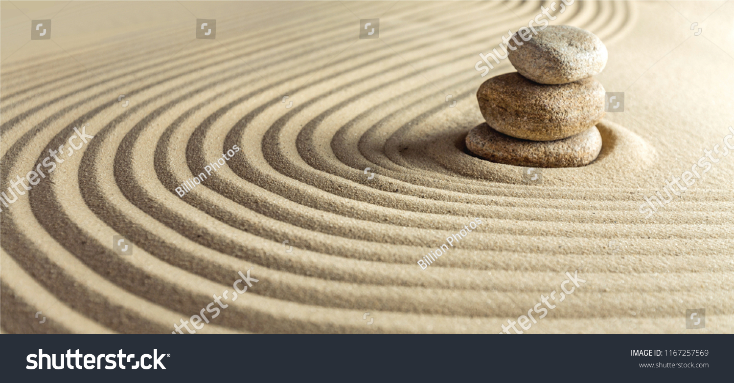 Japanese zen garden with stone in raked sand #1167257569