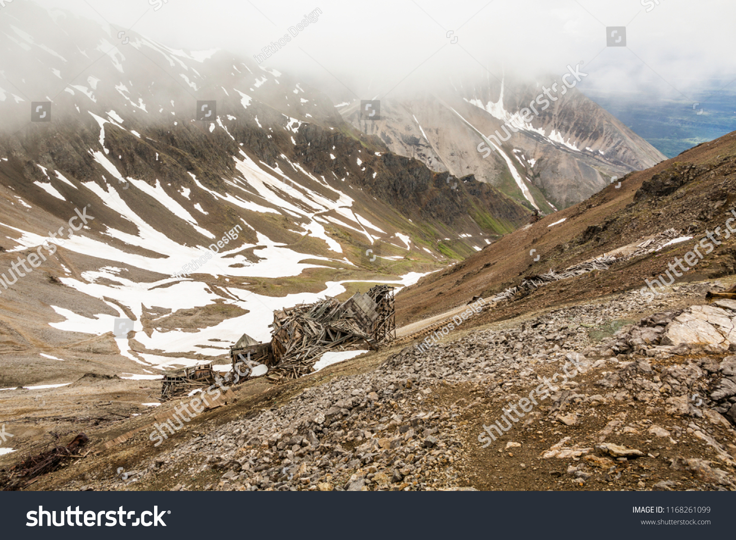 The ruins of the old Bonanza Mine precariously sit high in the mountains above Kennecott on a scree slop. Wrangell St Elias National park, Alaska. #1168261099