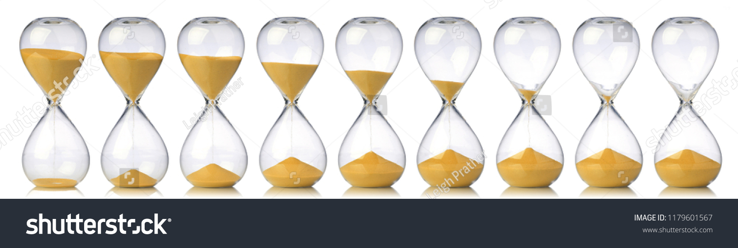 Collection of hourglasses with yellow sand showing the passage of time #1179601567