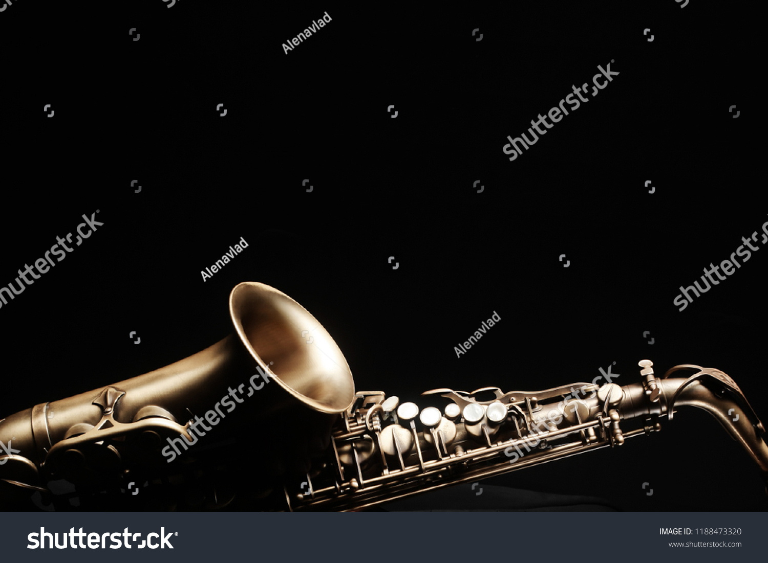 Saxophone jazz instruments. Alto sax isolated. Saxophone music instrument closeup on black #1188473320