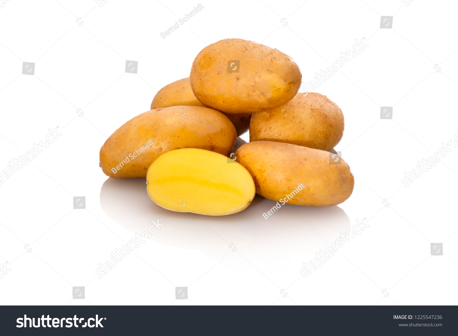Waxy potatoes Glorietta raw heap white isolated #1225547236