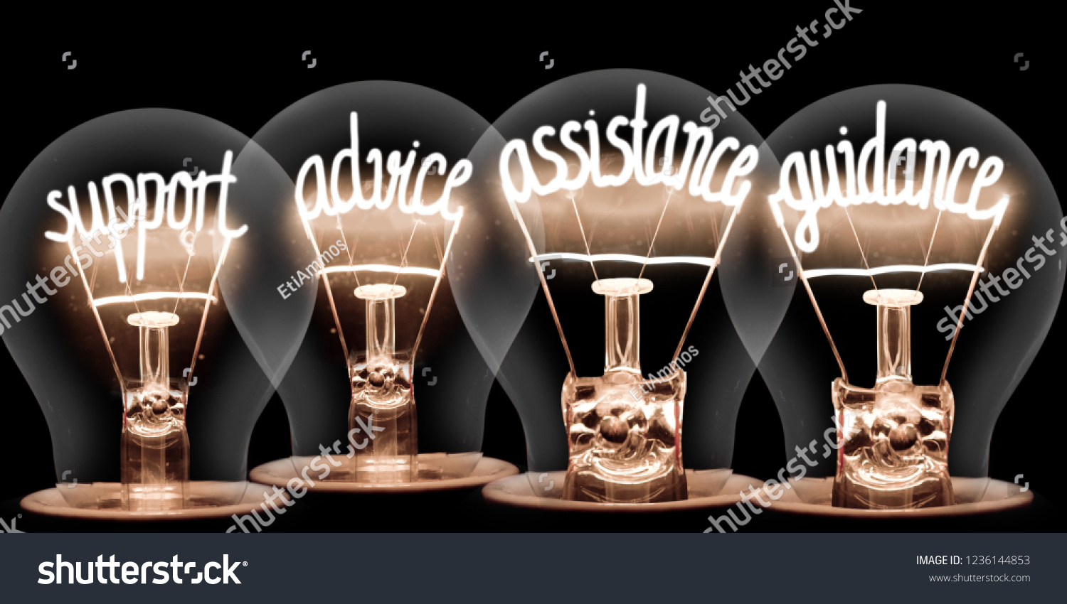 Photo of light bulbs group with shining fibers in a shape of SUPPORT, ADVICE, ASSISTANCE, GUIDANCE concept words isolated on black background #1236144853