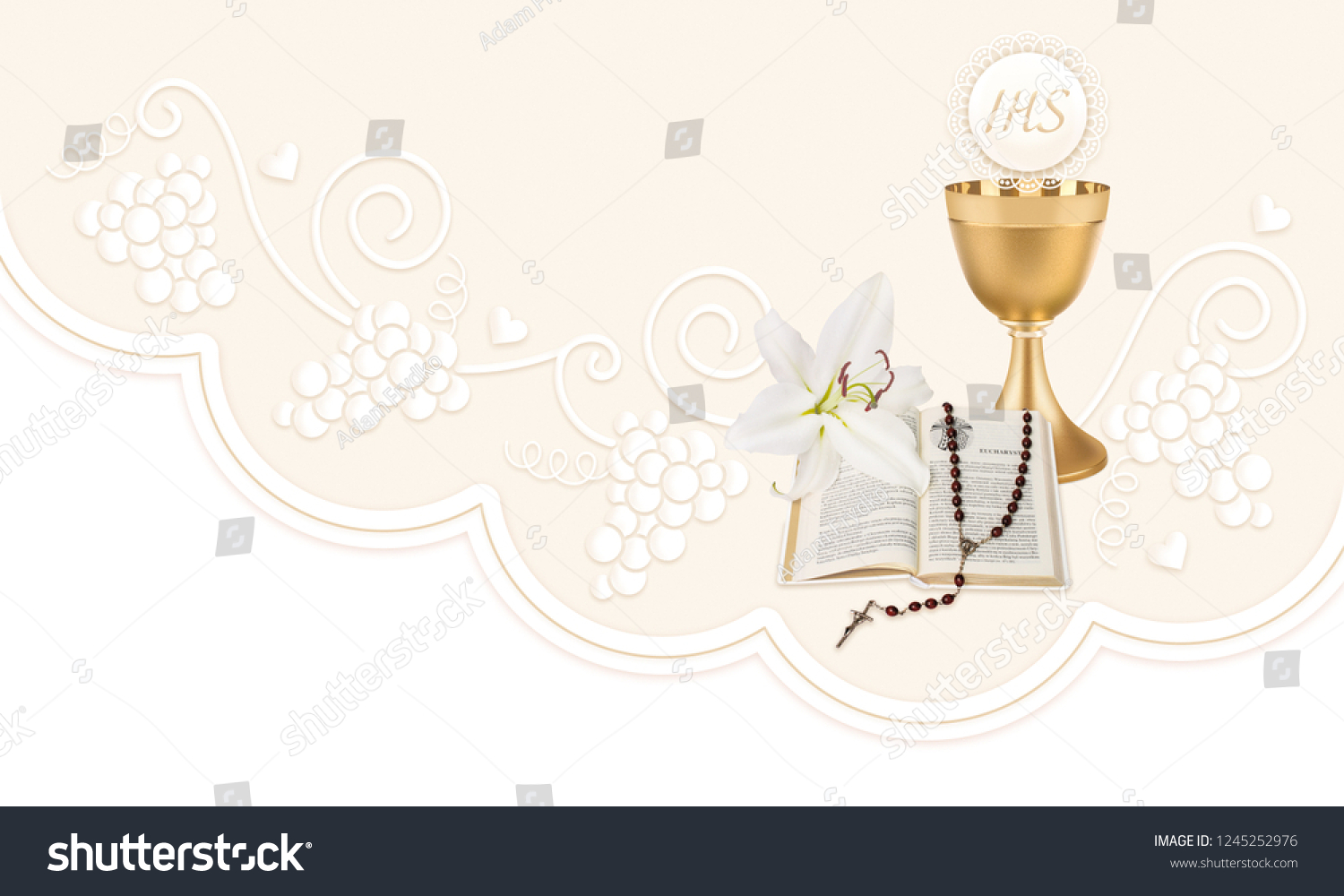 First Holy Communion, composition with a chalice, host,rosary, prayer book and lily flowers #1245252976