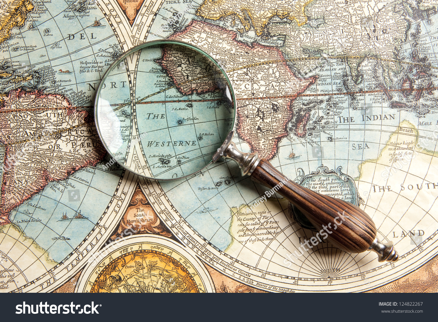 Magnifying glass and ancient old map #124822267