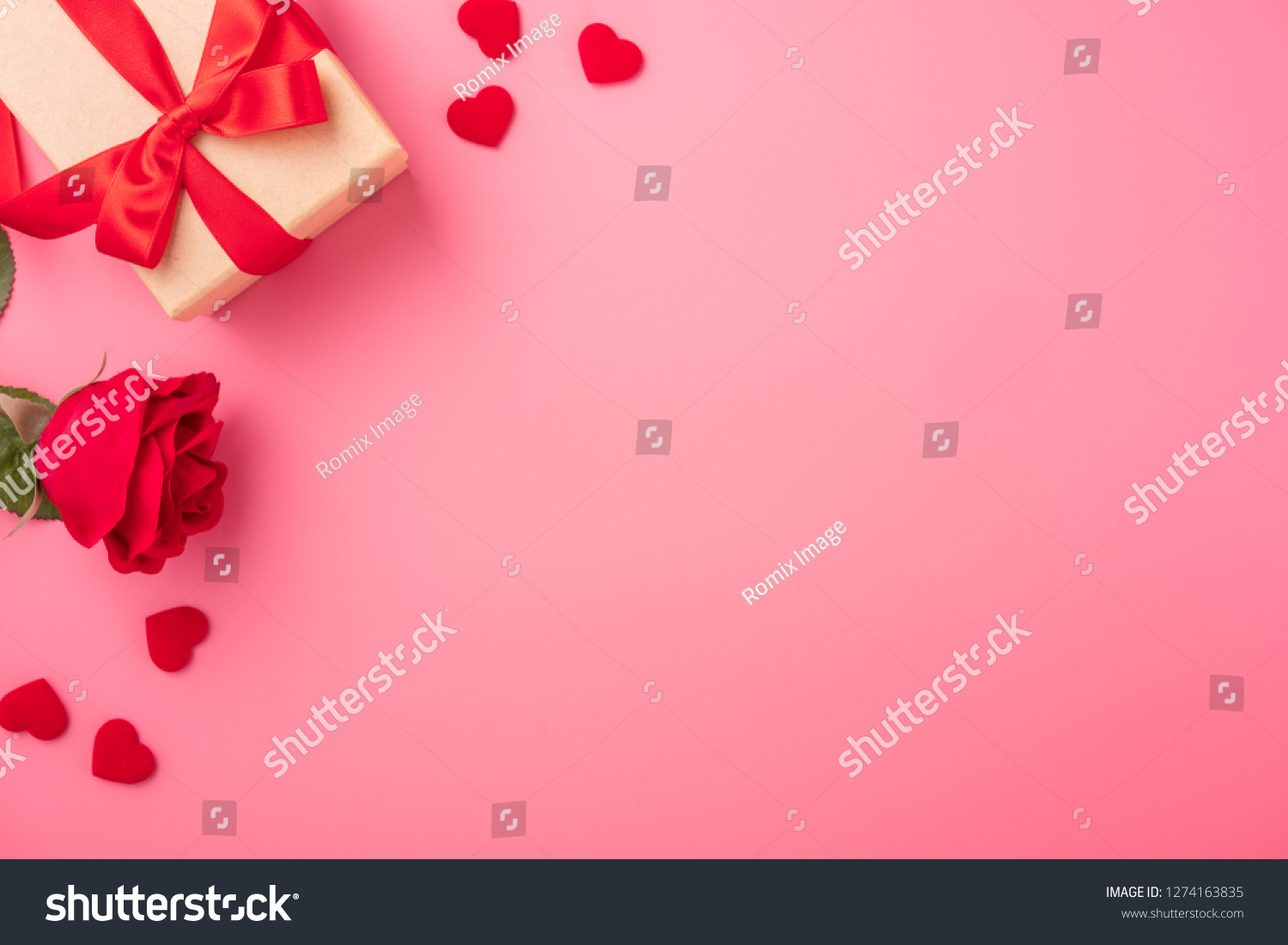 Kraft Gift box with beautiful red ribbon and rose, concept of Valentine's, anniversary, mother's day and birthday greeting, copyspace, topview. #1274163835
