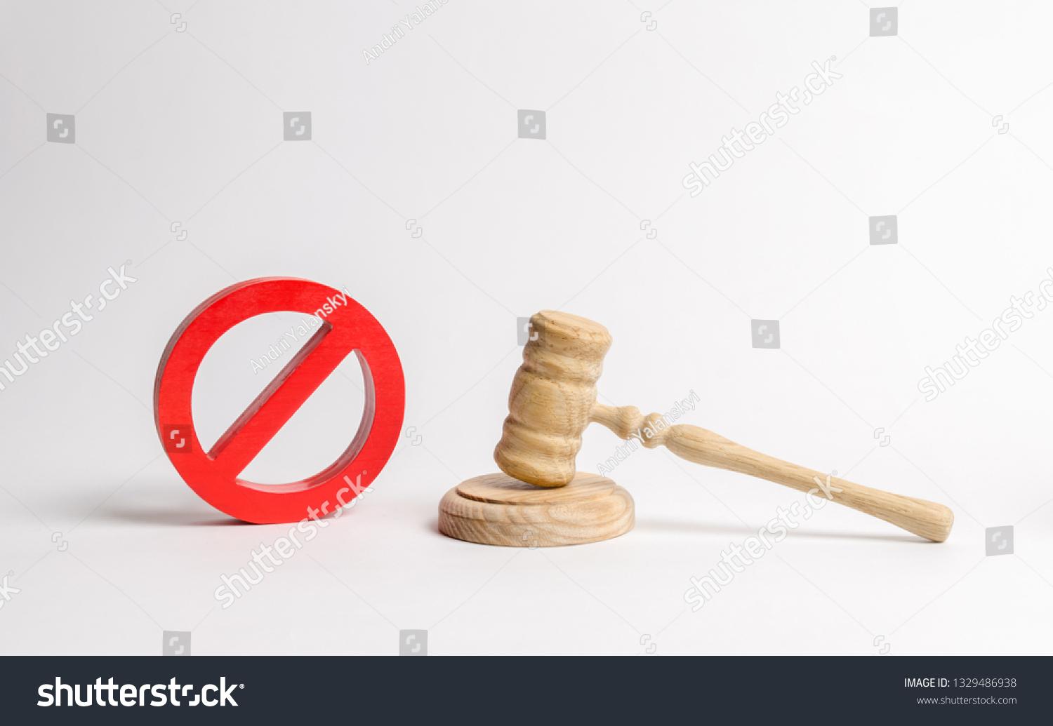 Judge's gavel and NO symbol. The concept of prohibiting and restrictive laws. Prohibitions and criminalization, repression, restriction of freedoms and rights of people and citizens. #1329486938