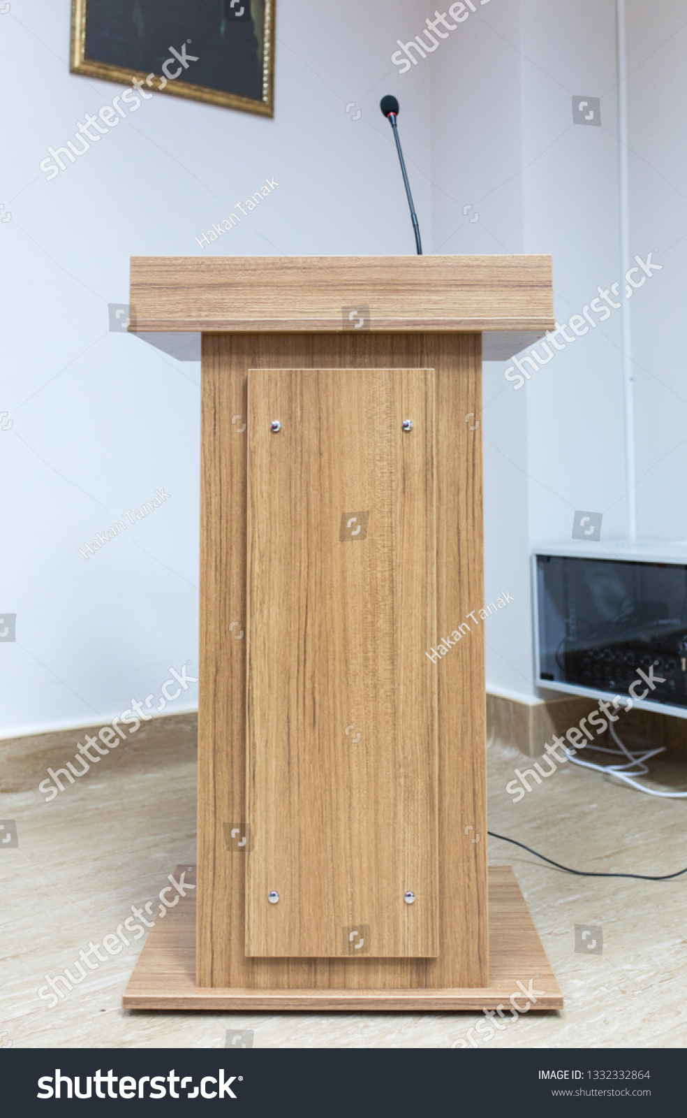 Wooden speech stand and microphone in conference room #1332332864