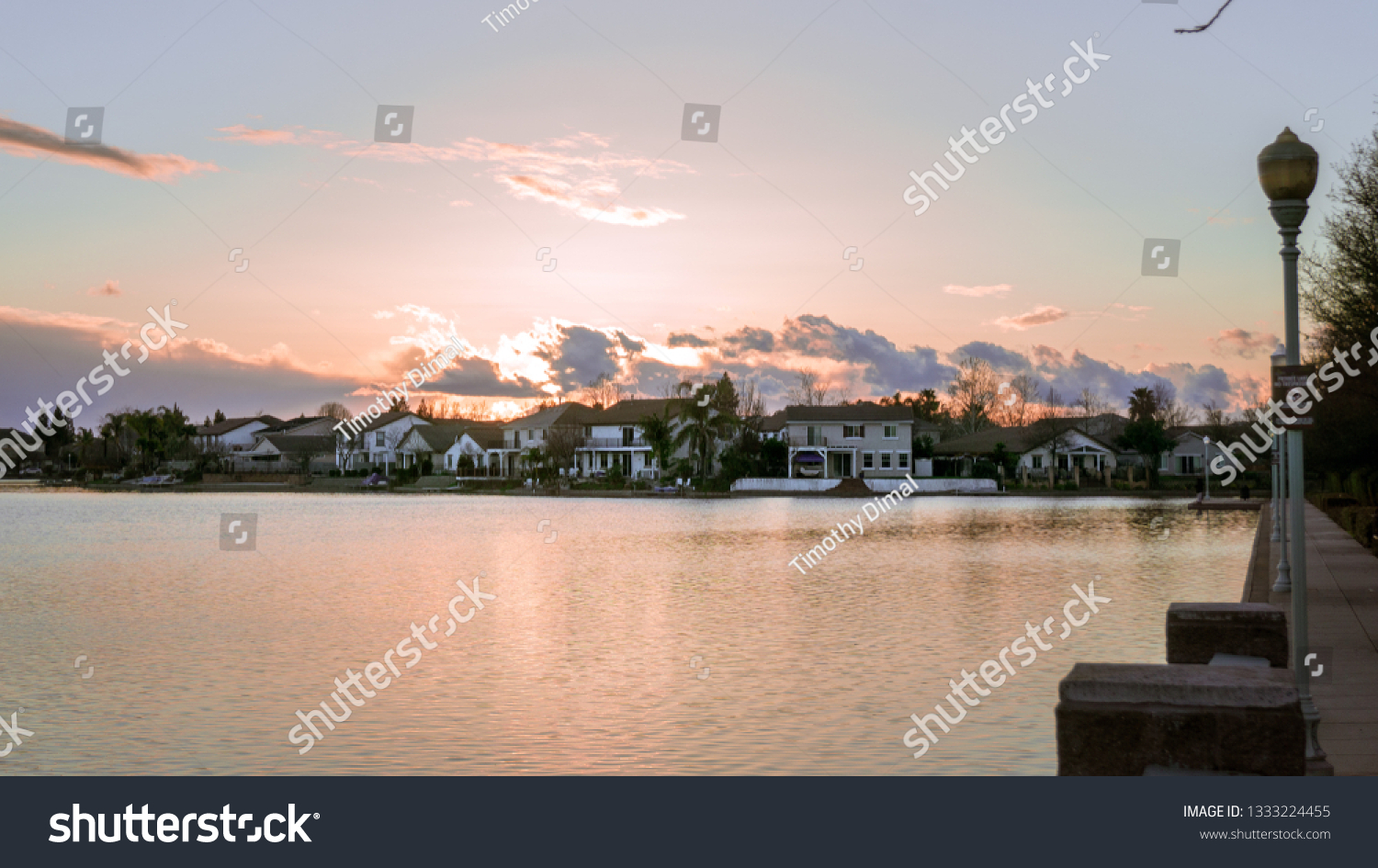 Sunset over man-made lake in Elk Grove California	 #1333224455