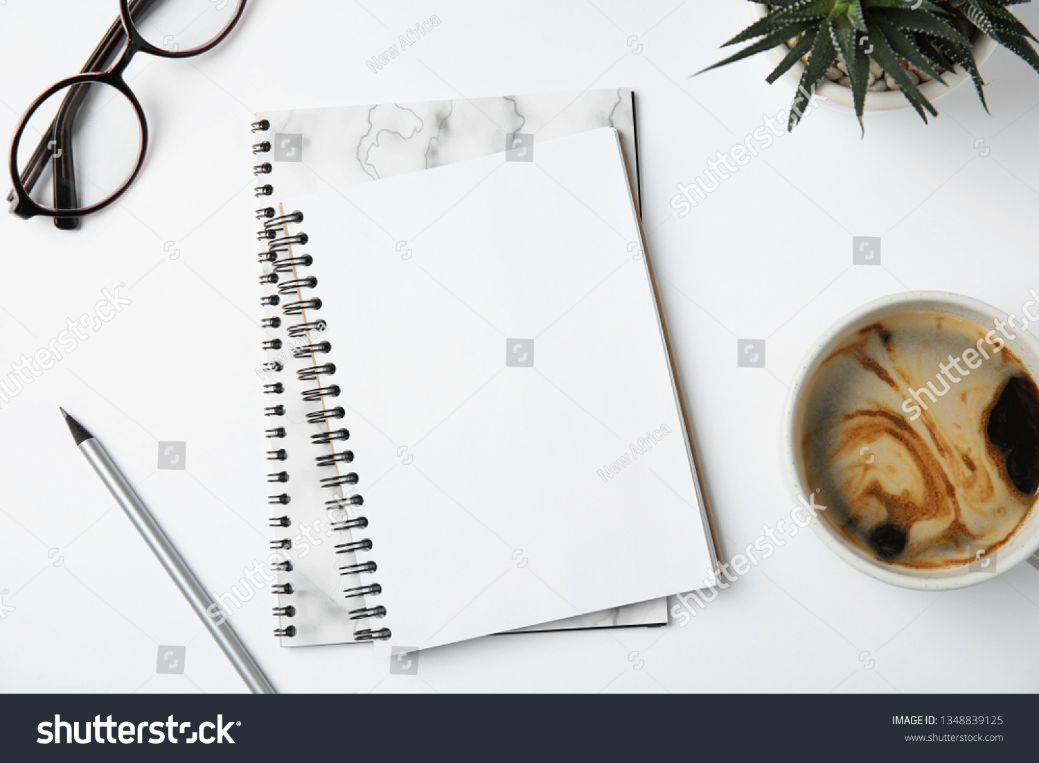 Flat lay composition with notebooks and coffee on white background #1348839125