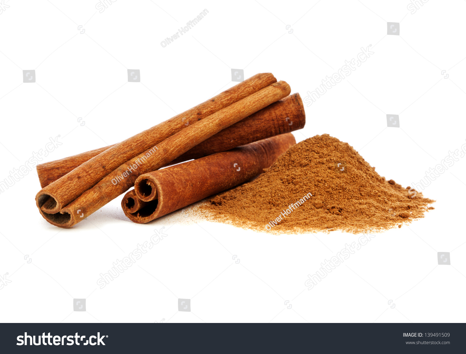 Cinnamon sticks and powder on white background #139491509