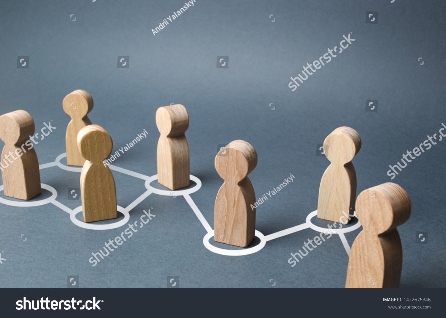 Chain of people figurines connected by white lines. Cooperation and interaction between people and employees. Dissemination of information in society, rumors. Communication. social contacts #1422676346