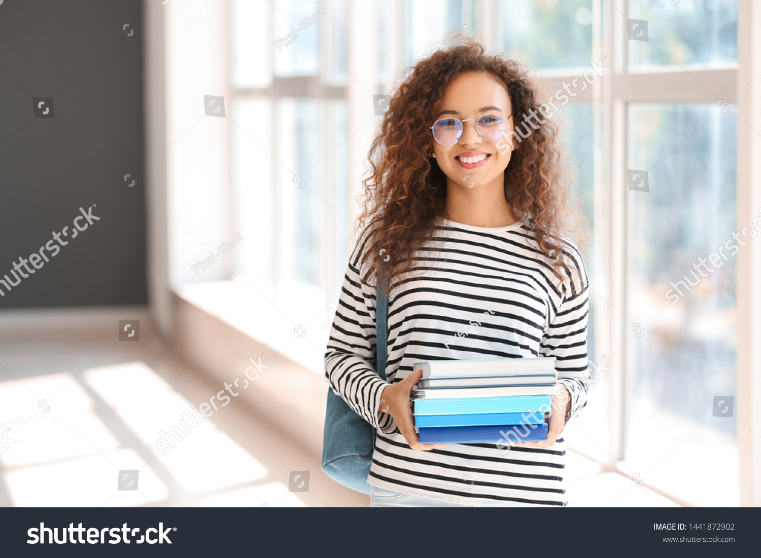 Young African-American student in university #1441872902