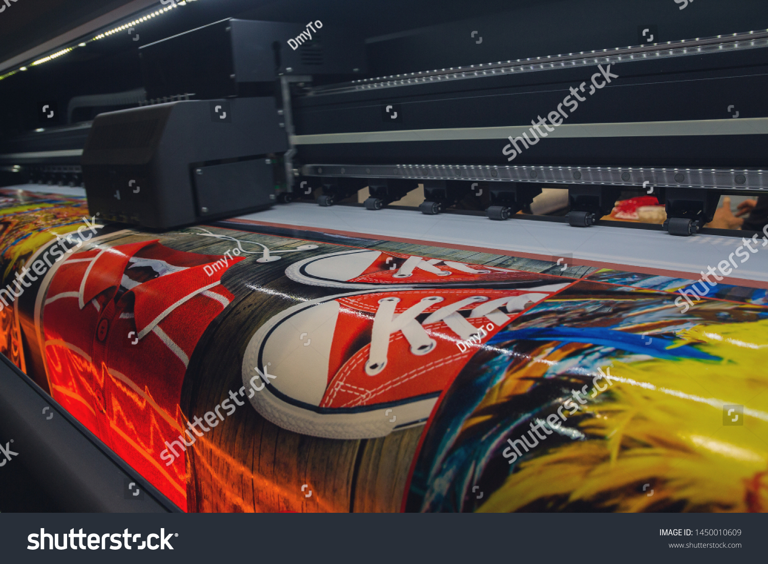 Large format printing machine in operation. Industry #1450010609