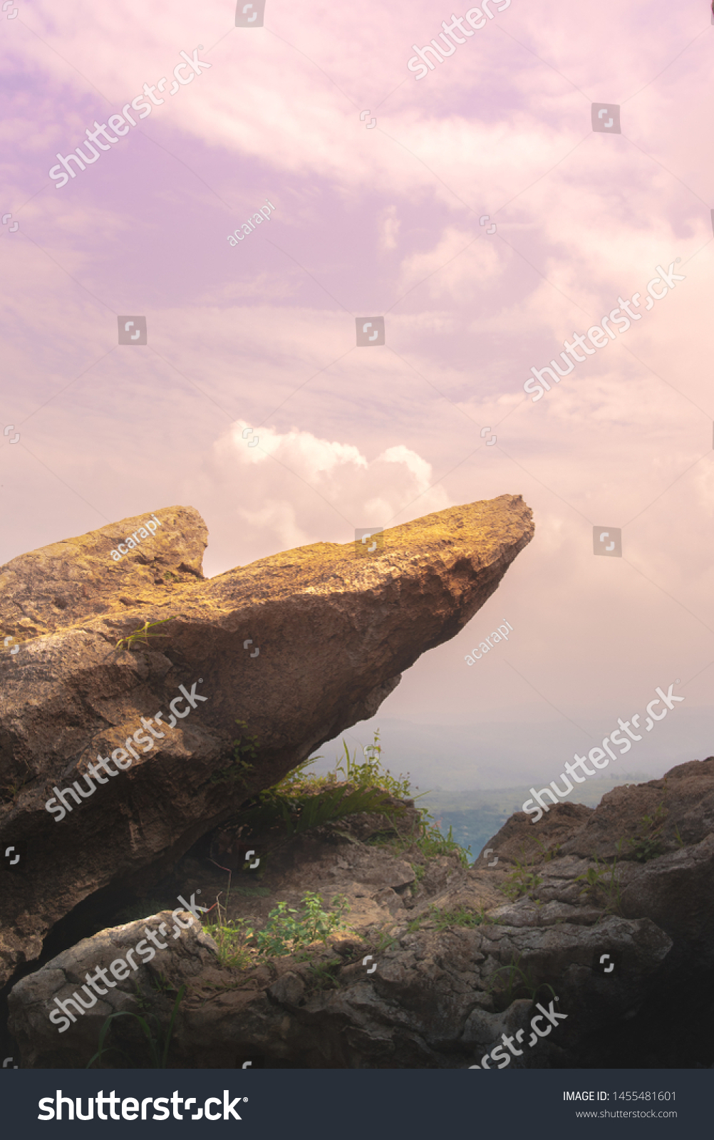 Point Edge of Cliff King Rock on Stone Garden at The Very Top of Mountain During Pink Sunrise or Sunset #1455481601
