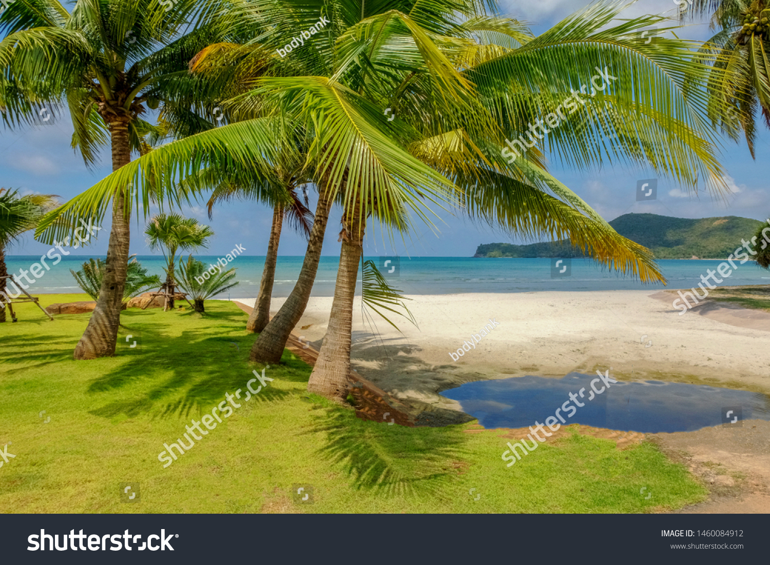 Sea and sky background. Sea view from tropical beach with sunny sky. Summer paradise beach of Thailand. Tropical shore. Tropical sea in Thailand. Exotic summer beach with clouds on horizon. Ocean beac #1460084912