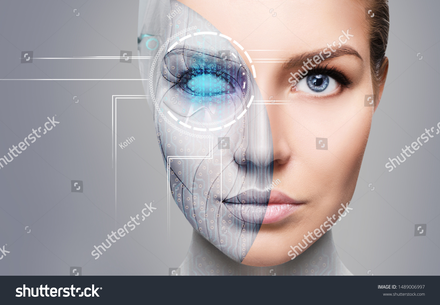 Cyborg woman with machine part of her face. Over gray background. #1489006997