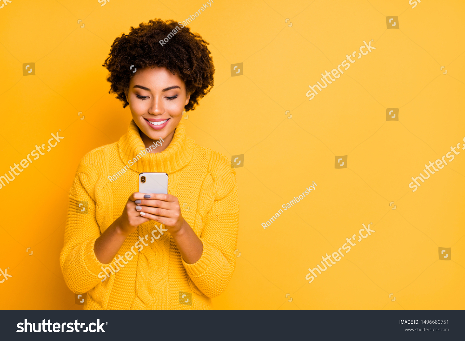 Copyspace photo of cheerful cute charming girlfriend browsing through her smartphone wearing pullover addicted to social media isolated with vibrant color background #1496680751