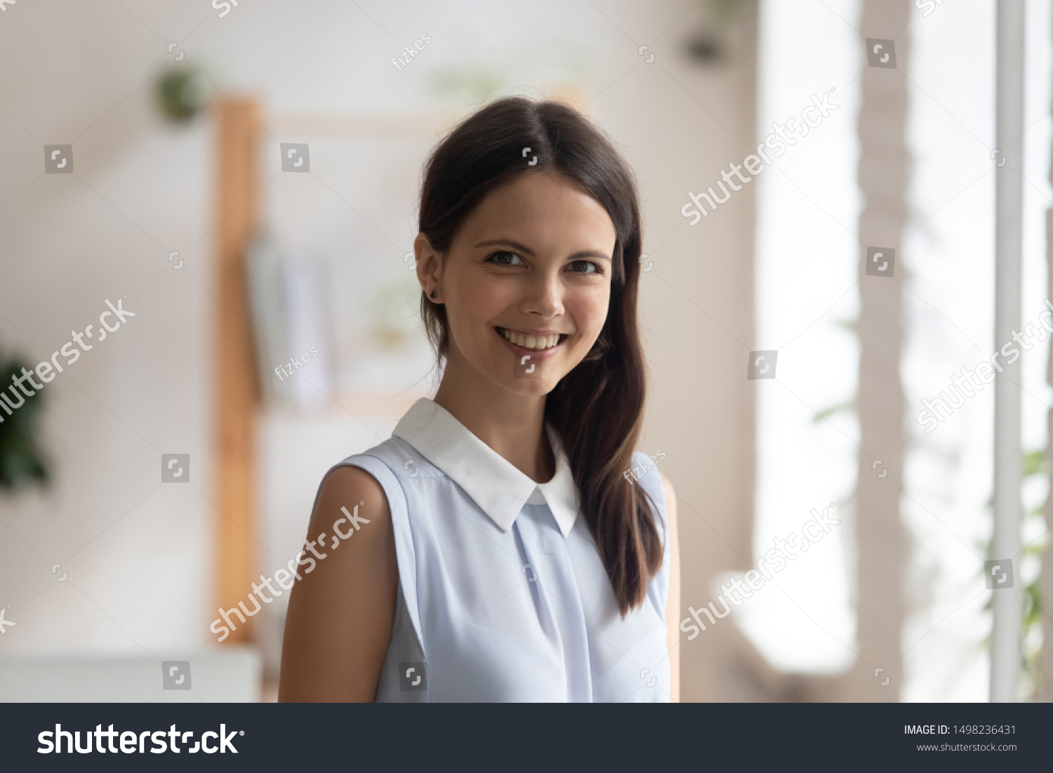 Headshot profile picture of confident young woman bank specialist or coach stand looking smiling at camera, happy positive millennial female employee or worker posing making photo, shooting for album #1498236431