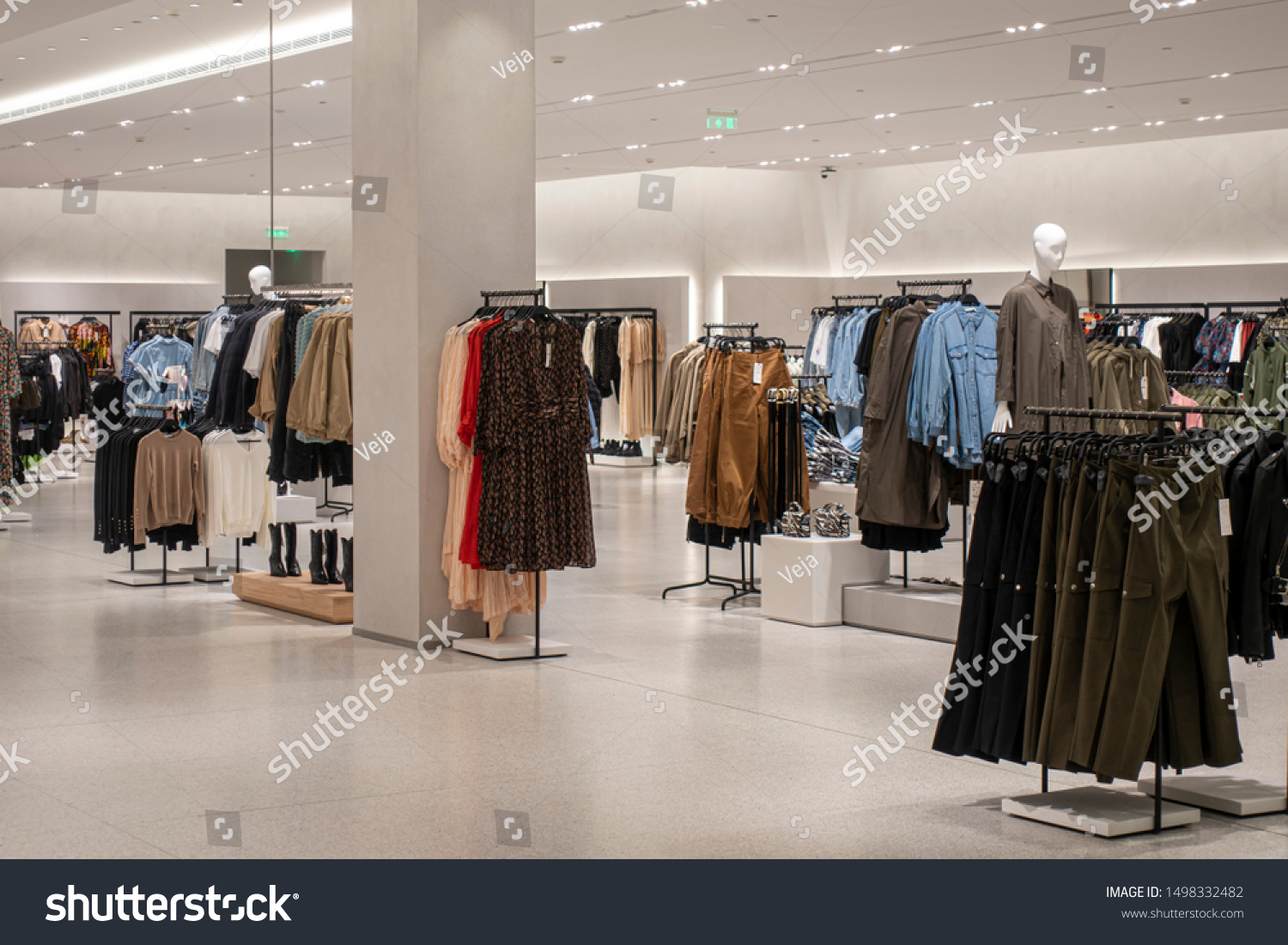 Modern fashionable brand interior of clothing store inside shopping center #1498332482