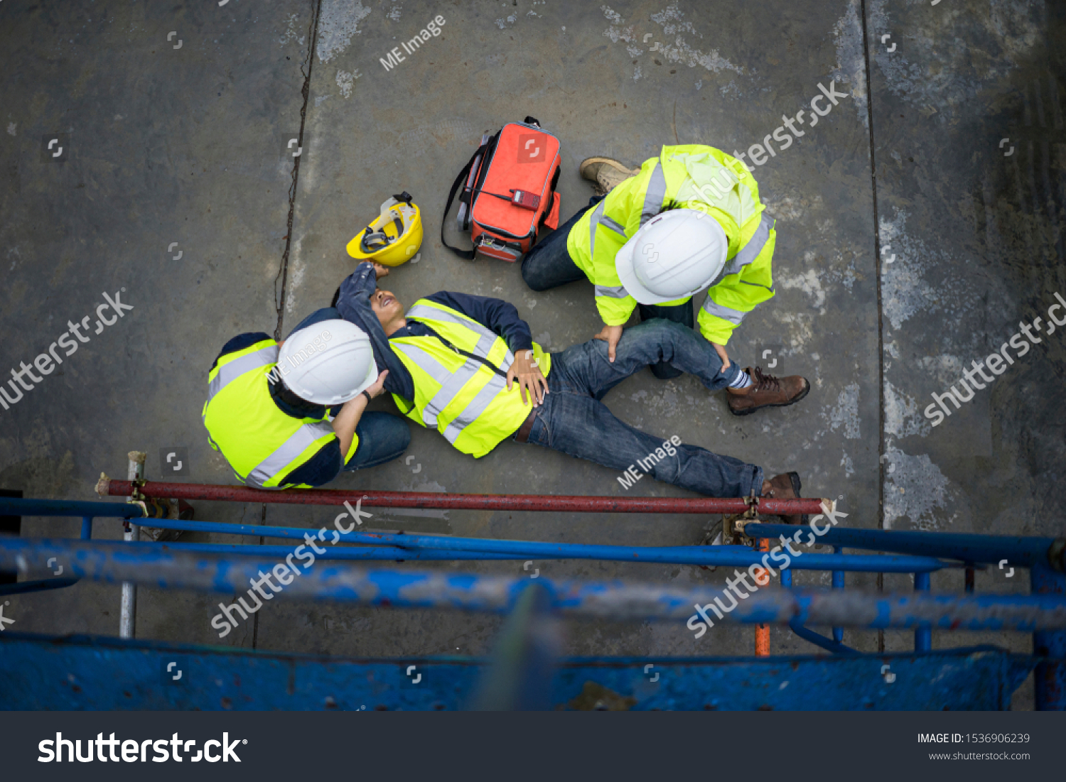 Basic first aid training for support accident in site work, Builder accident fall scaffolding to the floor, Safety team help employee accident. #1536906239