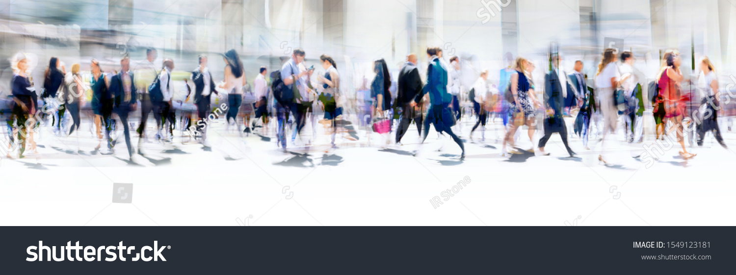 Lots of business people walking in the City of London. Blurred image, wide panoramic view of the road with people at sunny day. London, UK #1549123181