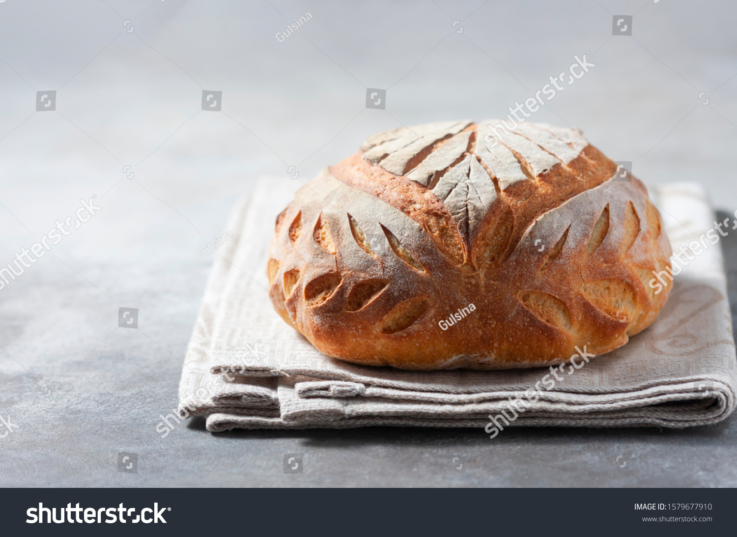 Sourdough bread. Freshly baked organic wheat bread. Selective focus, copy space #1579677910