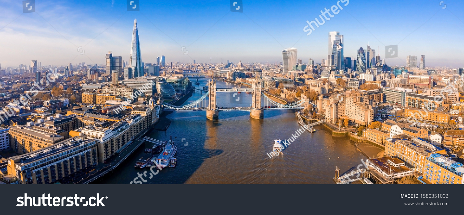 Aerial view of the Tower Bridge in London. One of London's most famous bridges and must-see landmarks in London. Beautiful panorama of London Tower Bridge. #1580351002
