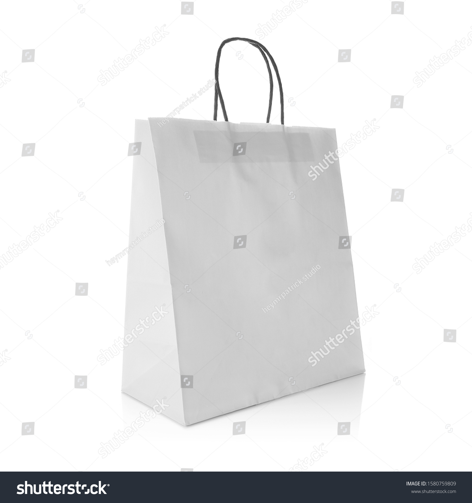 White kraft paper gift bag with handle for easy carry. Cut out on white background. Eco friendly & reusable shopping bag for groceries, gifts, goodies. Design template for Mock up, Branding, Advertise #1580759809