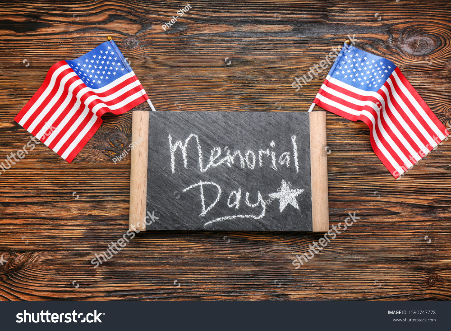Chalkboard with text MEMORIAL DAY and USA flags on wooden background #1590747778