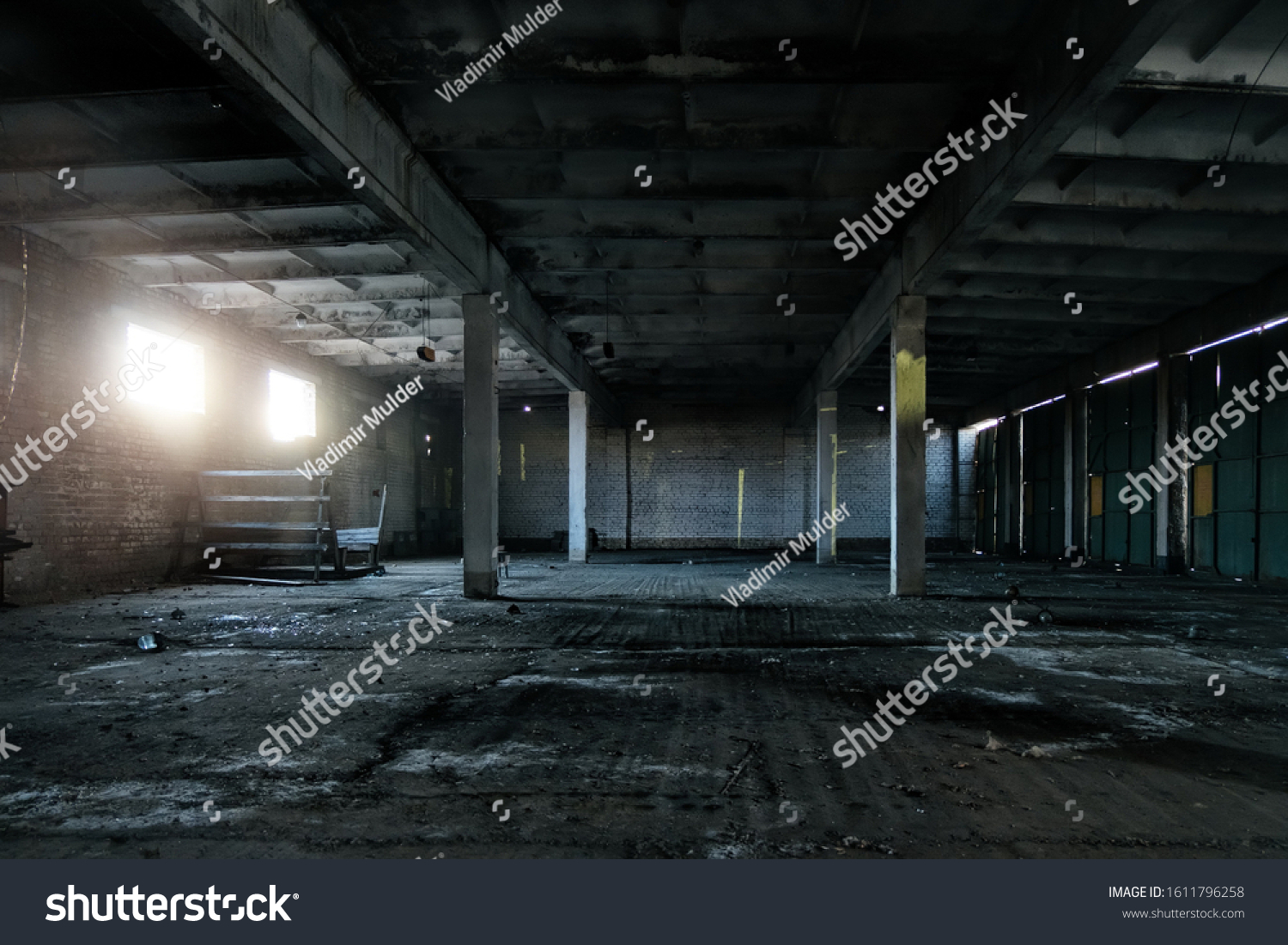 Old abandoned industrial building interior #1611796258